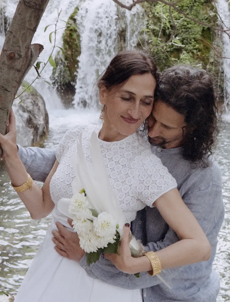 book an elopement together under waterfall